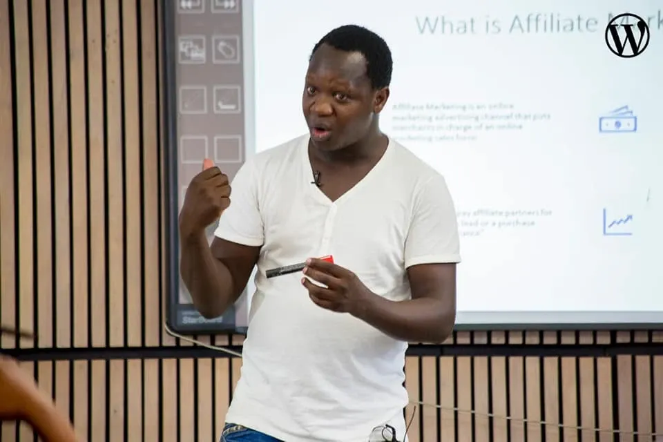 Photo of Patrick Mahinge speaking at a past event